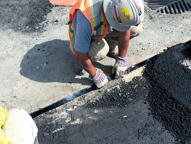 Premband used to seal vertical joints between asphalt, concrete and steel in road repair and construction